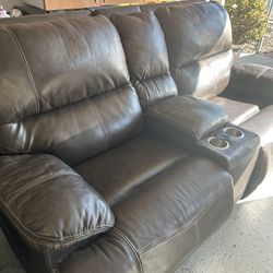 Leather Love Seat With Console And Cup Holders