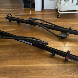 Pair Of Yakima Roof Top Bike Racks 