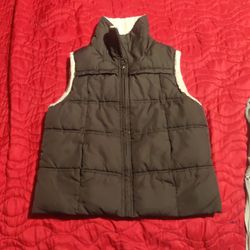 Black Vest For Adults Or Kids This Size.