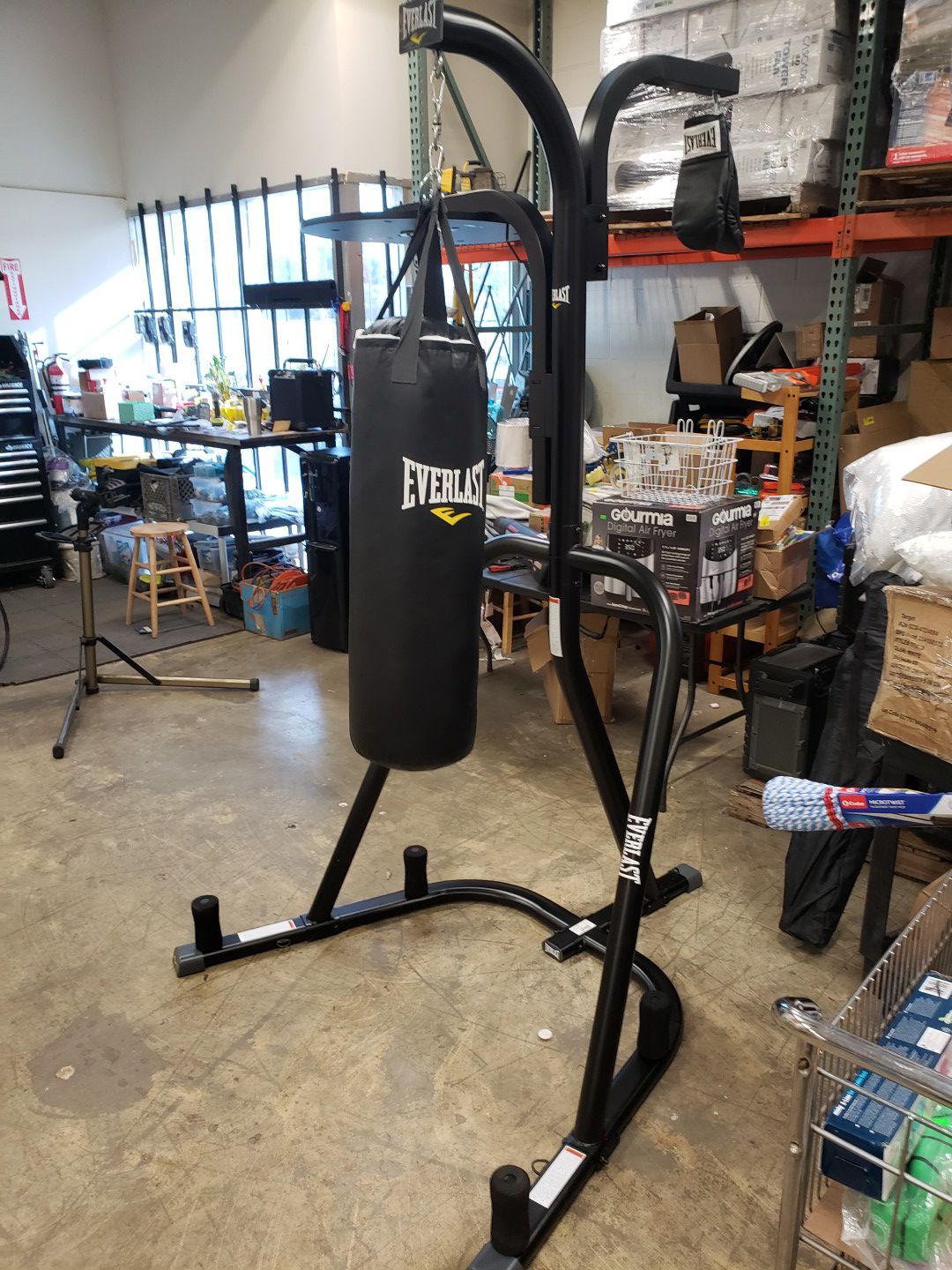 Everlast bag stand with 70 pound bag. Has spot for speed bag and double end striking bag. Comes with gloves. $200 YOU WILL NEED A TRUCK FOR PICK UP