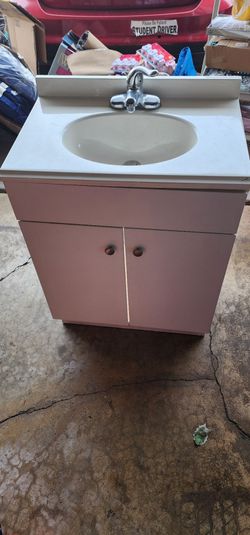 White Bathroom Vanity with Sink and Faucet