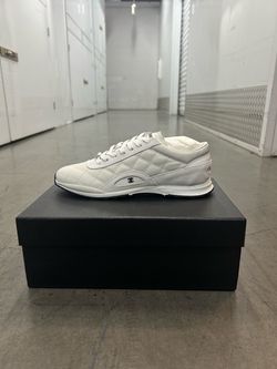 Chanel Quilted Leather Low-Top Sneakers