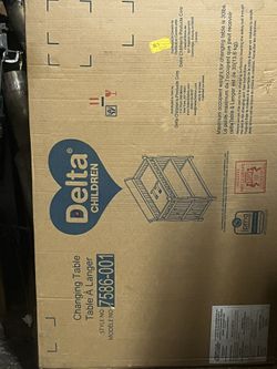 NEW Changing Table W Shelfs