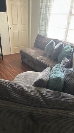 L shaped couch and love seat and additional oversized chair