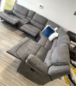 Alejandra grey modular reclining sectional only $1299. Easy finance option. Same-day delivery.