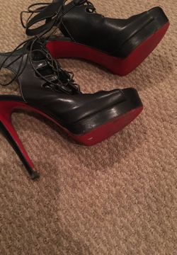 Christian Louboutin lace up heels