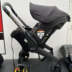 Doona carseat stroller + base, bag, mat, mirror