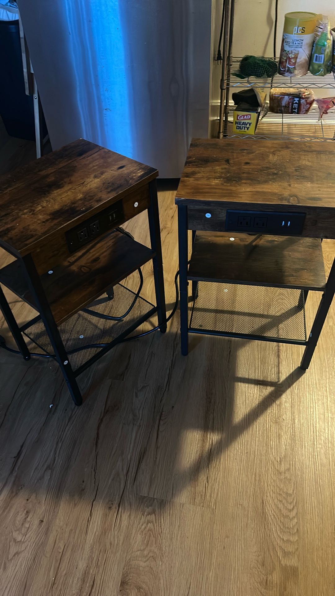 Two tables with blue Bluetooth in them for 100 bucks