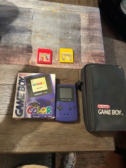 Game boy color “grape” with pokemon yellow and red and original case