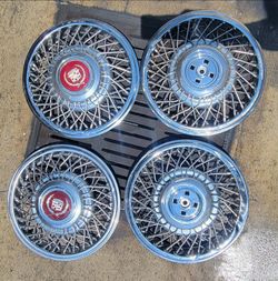 1986 to 1988 Cadillac 14" Wire Spoke Hubcaps.