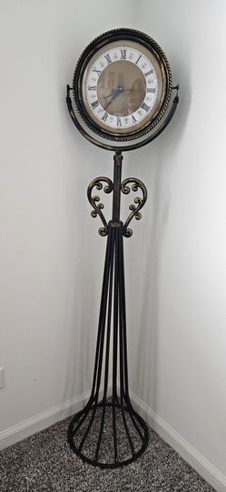 Antique standing clock