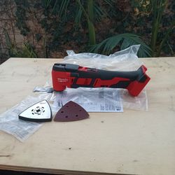 Milwaukee 18 v  new.  Multi tool.    W / blade