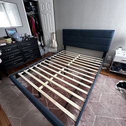 Queen upholstered bed