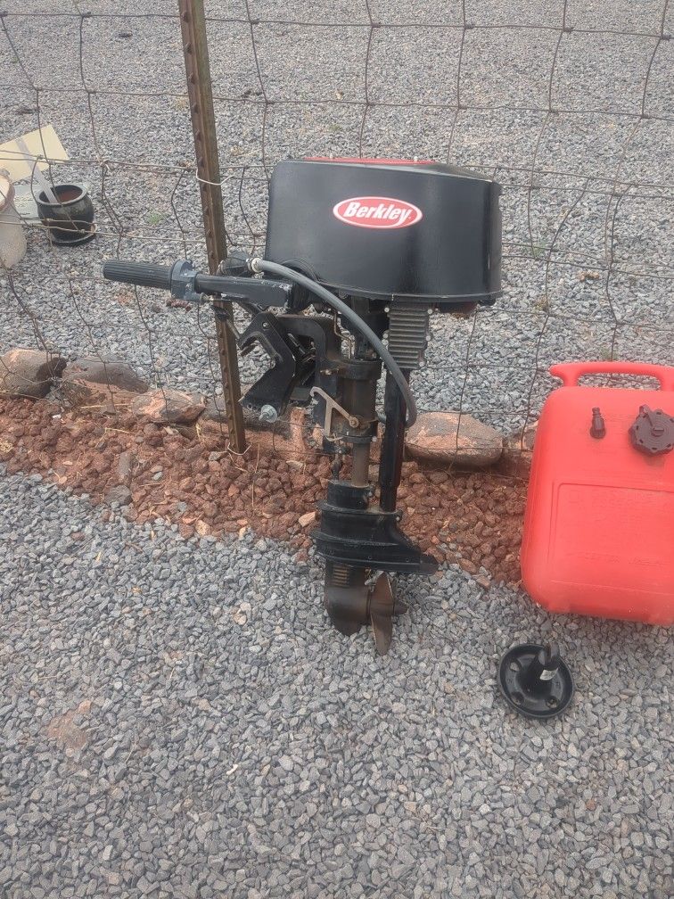 10 Horse Outboard Motor. Berkeley Model. Comes With A 6.5 Gal Fuel Tank, 1/2 Full .