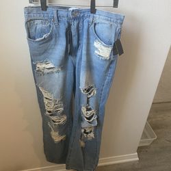 Fashion Nova - tattered jeans