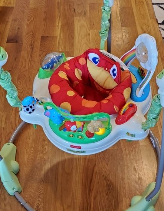 FREE : Fisher-Price Rainforest Jumperoo Bouncer