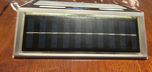 Solar powered address sign