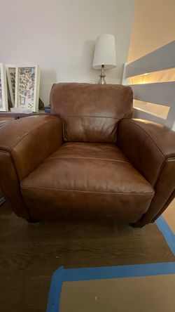 Brown leather arm chair
