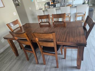Dining table with 6 chairs from living spaces