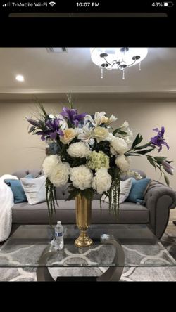 Fiberglass vase with silk flowers arrangement