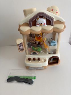 Claw machine with toys 🧸 in working condition for kids fun party