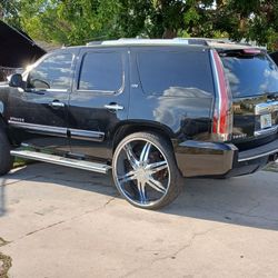 Black Chevy Tahoe W/  White 30” Rims