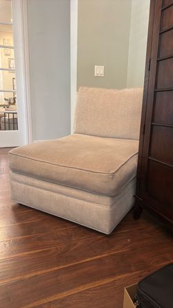 Oversized cream chair.