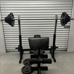 Squat Rack, Weights, Bench And Bar. Exercise Equipment 