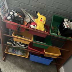 Storage for children’s toys complete with bins