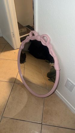 Pink Oval Mirror with Bow Detail