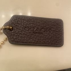 New brown leather coach tag