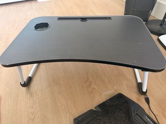 On bed table