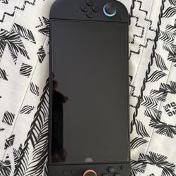 Nintendo Switch 2 w/ Mario Kart World and Switch 1 Pro controller