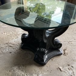 Glass topped pedestal table 