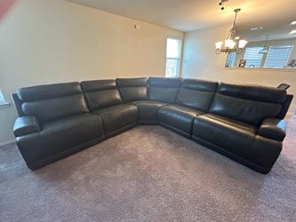 Leather Sectional.  Zero gravity!