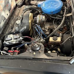 Mazda RX7 , year 1985. Clear tittle. Automatic. Black. 12A engine.