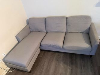 Reversible sectional sofa, light gray linen