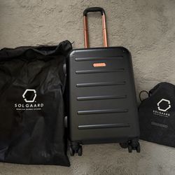 Solgaard - Carry On Closet Suitcase 