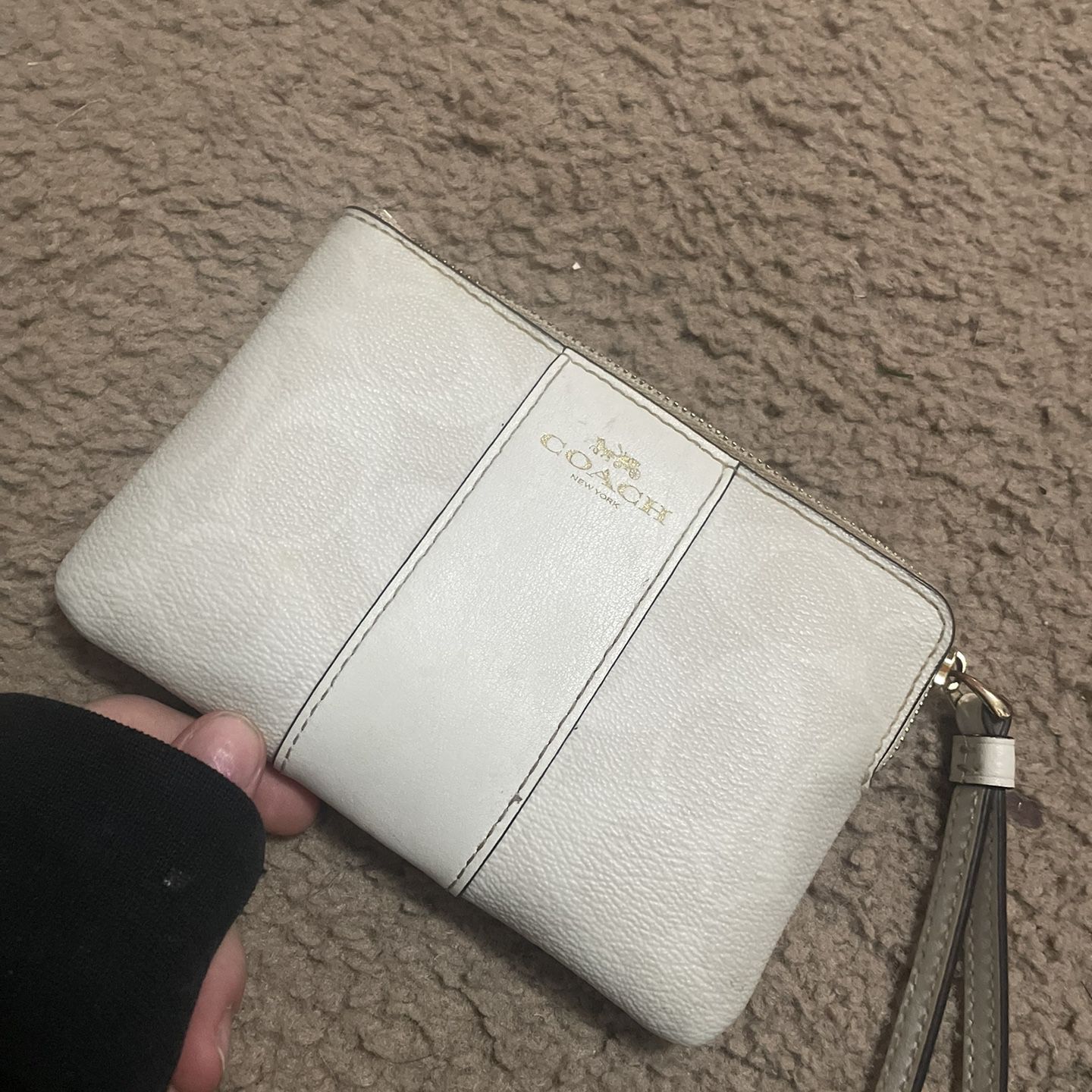 white COACH wallet 
