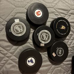 NHL Hockey Pucks- Make Offer 