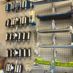 Pool and spa brushes and vacuum