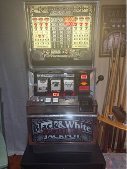 Slot machine and stand $500 paid $1000