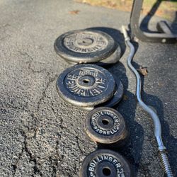 180 pounds 1” plates weights, bench and two bars 