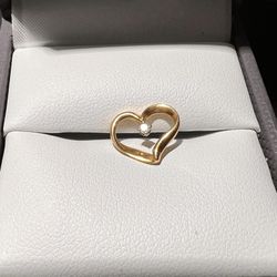 Beautiful solid 14k yellow gold pendant heart with a real diamond