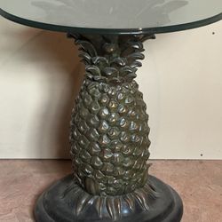 Vintage Pineapple Table With Glass Top. Nice condition. 24” tall. Glass is 23” diameter.  Base is resin. 