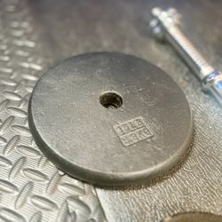 Standard Steel Curl Bar with Cast Iron Weight Plates pairs: 15#, & 4X 5 #. Total: 66 pounds