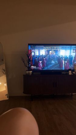 modern dark wood/ribbed TV stand