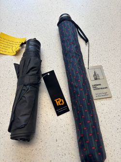 Two brand new umbrellas, both for five dollars