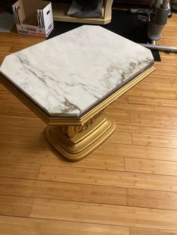 Solid marble and gold bottom table for $60