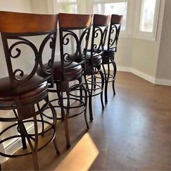 Bar Stools New in Original Packaging’s Set of 4 Stunning Bronze Finish 360 Degree Swivel Function Retailed For $755.96.